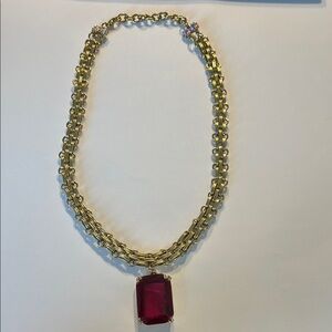 Elegant Gold Necklace with Red Pendant
